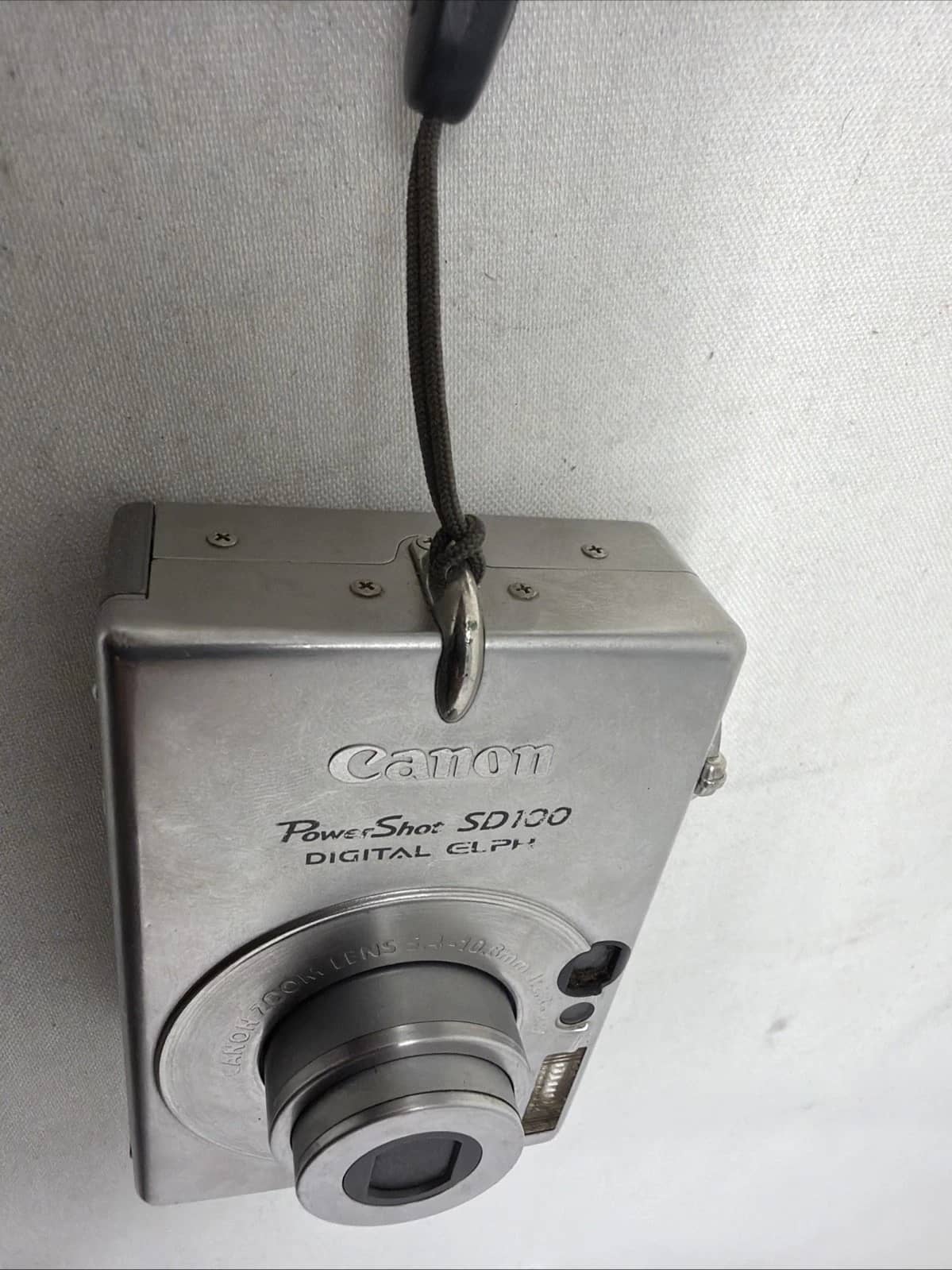 Canon PowerShot SD100 Digital Cameras Silver For parts or not working Body Only