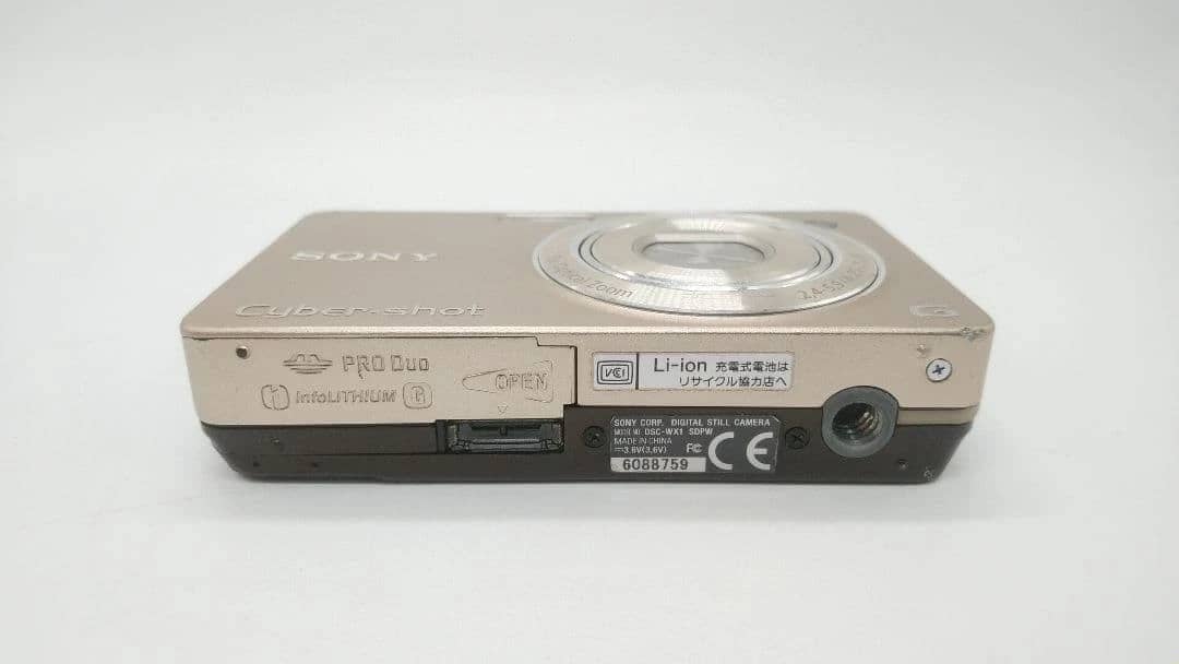 Sony Cyber-shot DSC-WX1 Digital Cameras Gold Used - Good Body Only