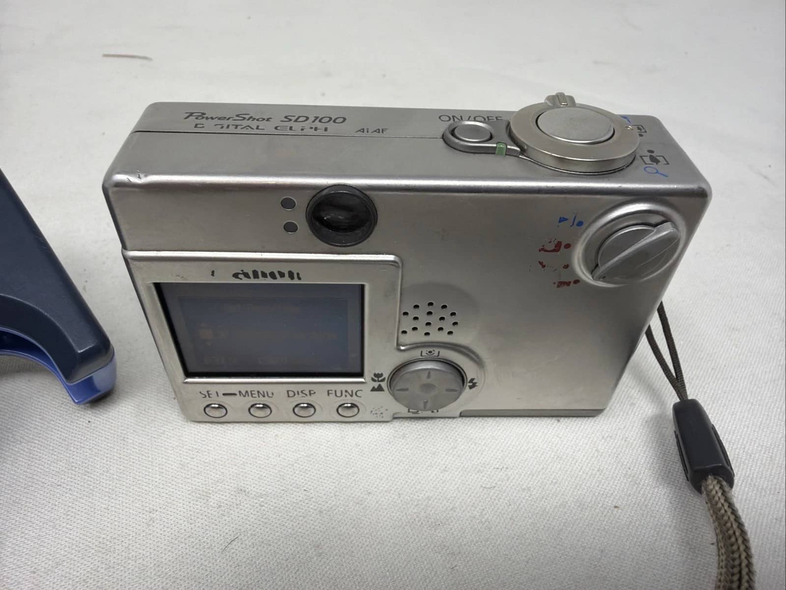 Canon PowerShot SD100 Digital Cameras Silver For parts or not working Body Only