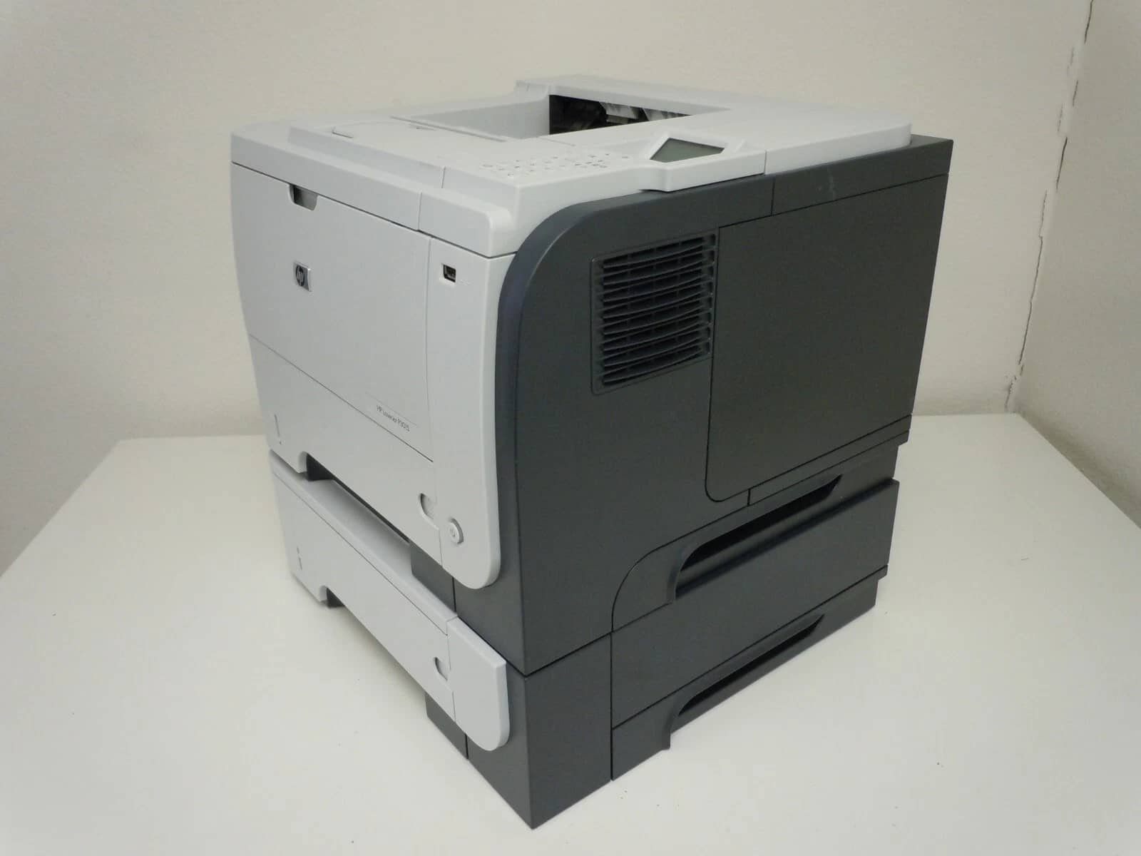 HP LaserJet P3015n with extra 500-sheet paper tray Printers Refurbished - Excellent