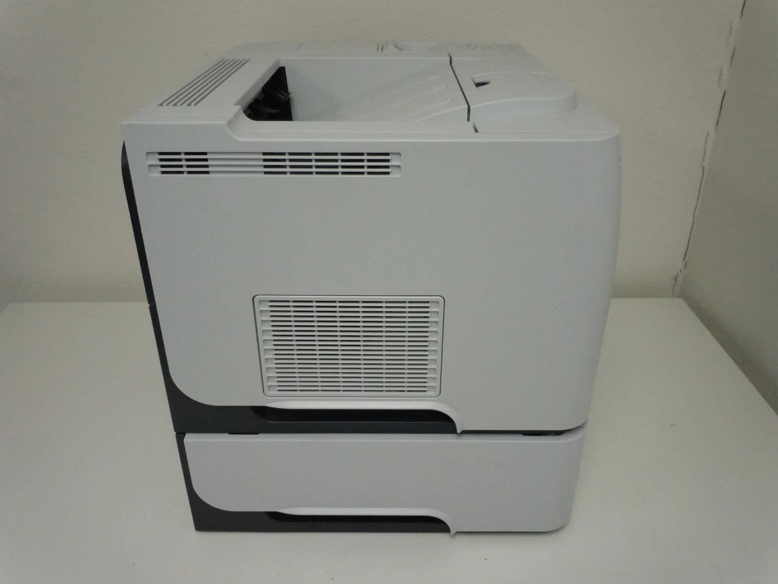 HP LaserJet P3015n with extra 500-sheet paper tray Printers Refurbished - Excellent