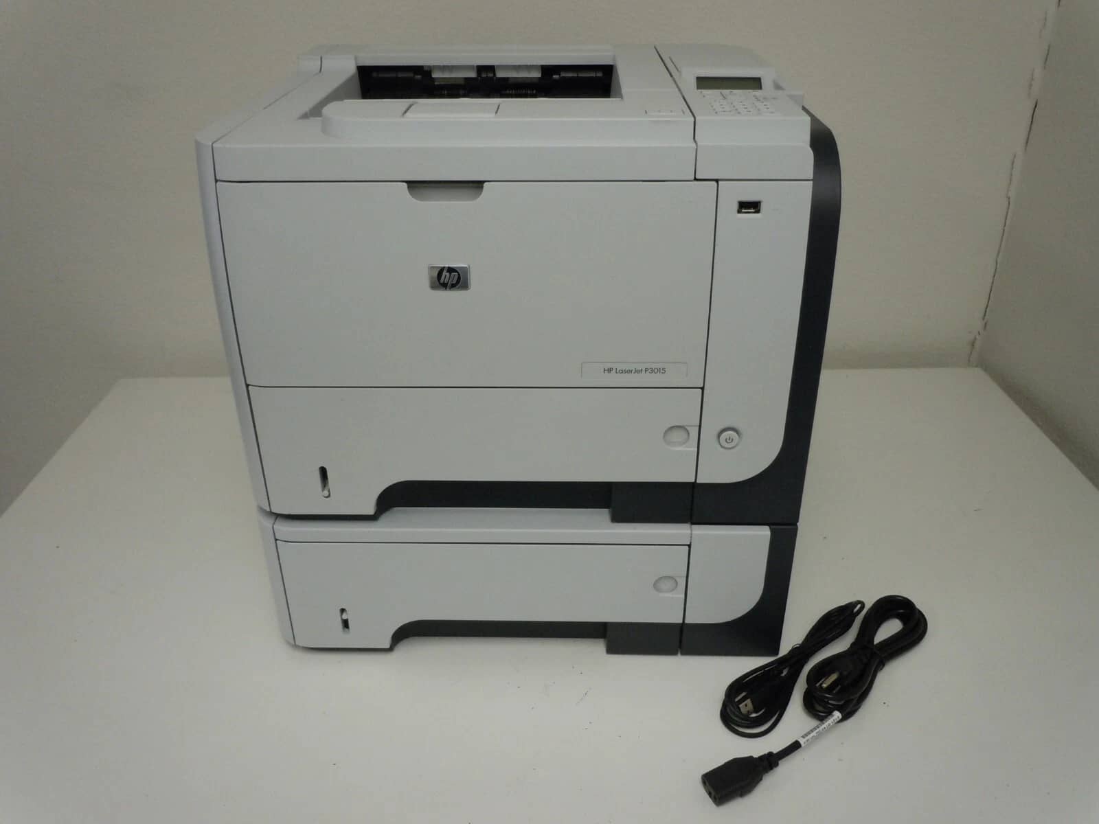 HP LaserJet P3015n with extra 500-sheet paper tray Printers Refurbished - Excellent