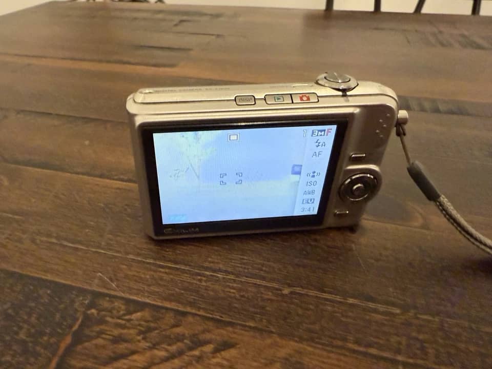 Casio Exilim EX-Z1000 Digital Cameras Silver New Body Only