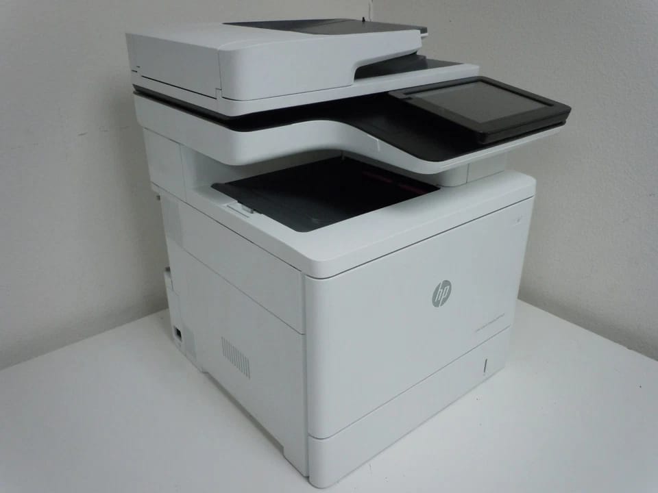 HP LaserJet Enterprise M577dn Printers Used - Good
