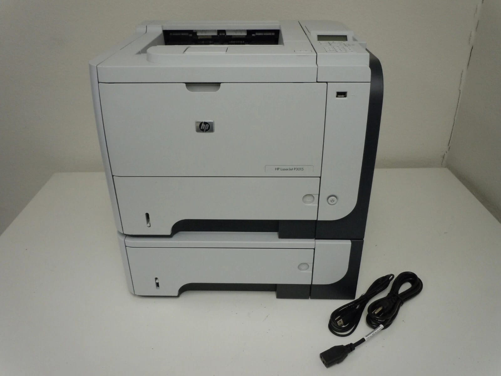 HP LaserJet P3015n with extra 500-sheet paper tray Printers Refurbished - Excellent