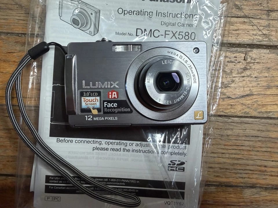 Panasonic LUMIX FX580 Digital Cameras Silver New Body Only
